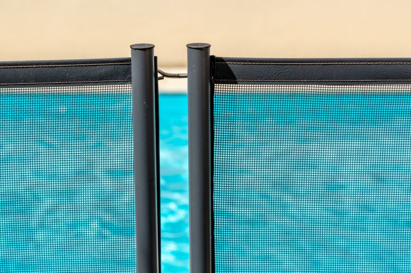Pool with Mesh Safety Barrier